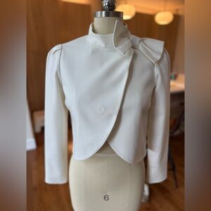 Alice + Olivia white bolero/ jacket with a bow detail. Size S